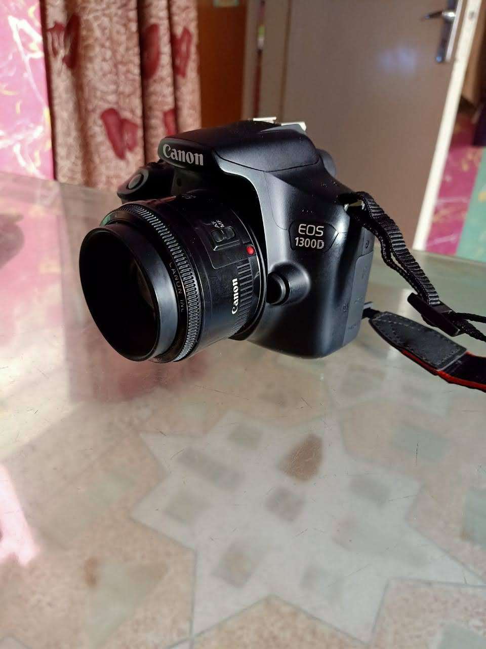 olx 1300d canon